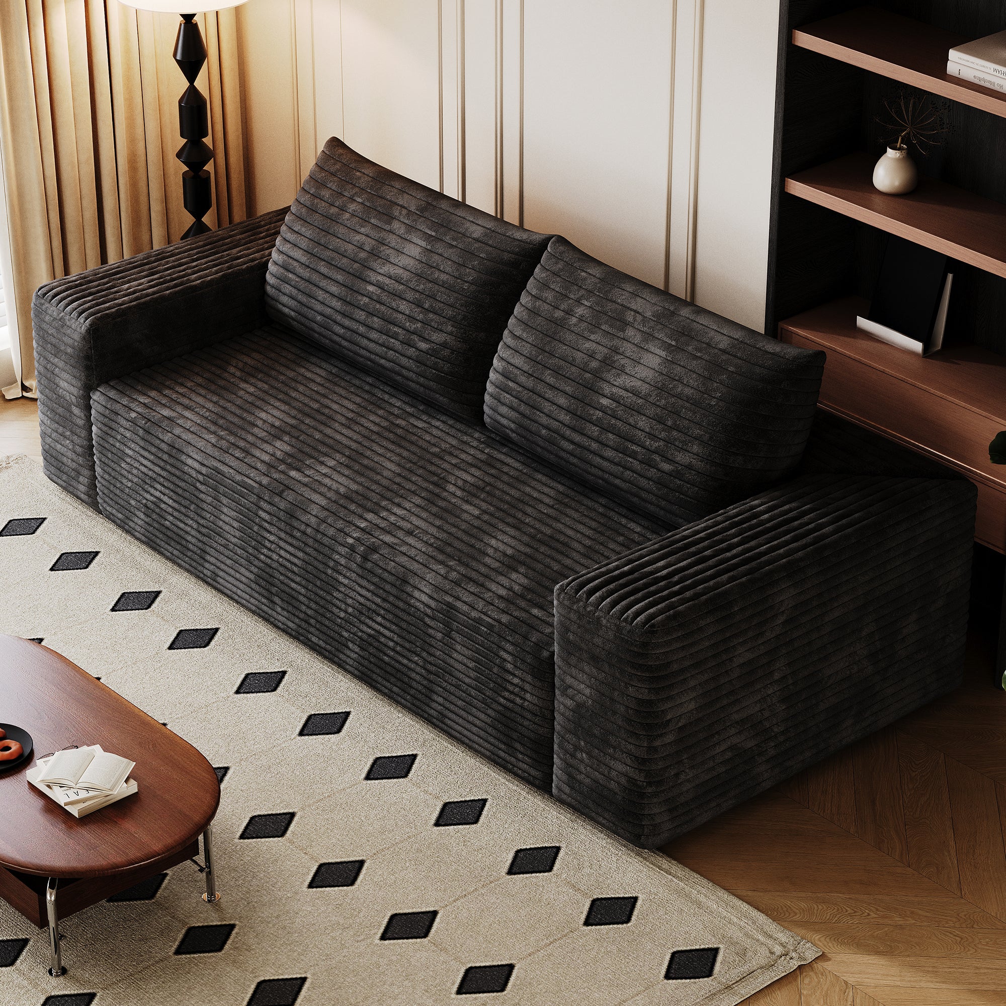 Black corduroy 2-seater sofa three-quarter view
