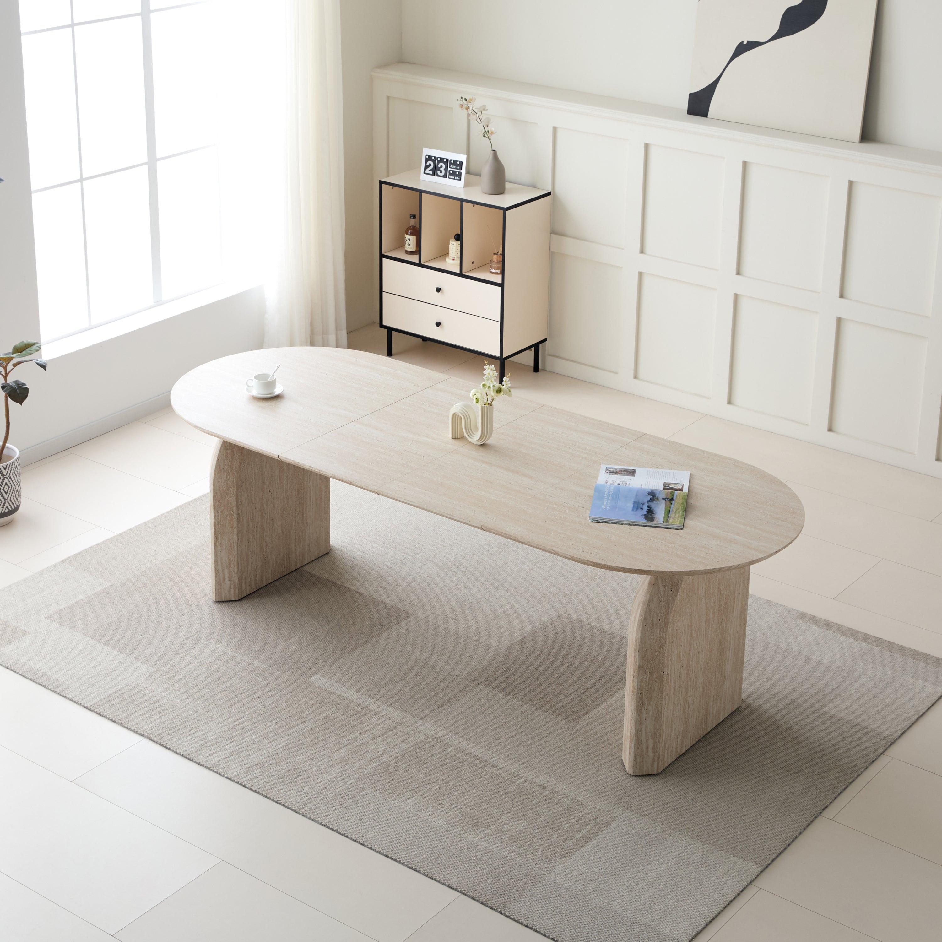 Off white oval extendable dining table — front view