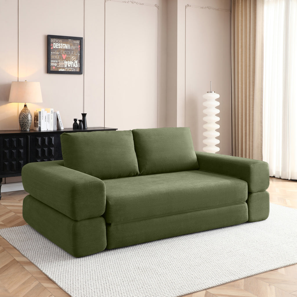 Green corduroy sofa bed — angle view