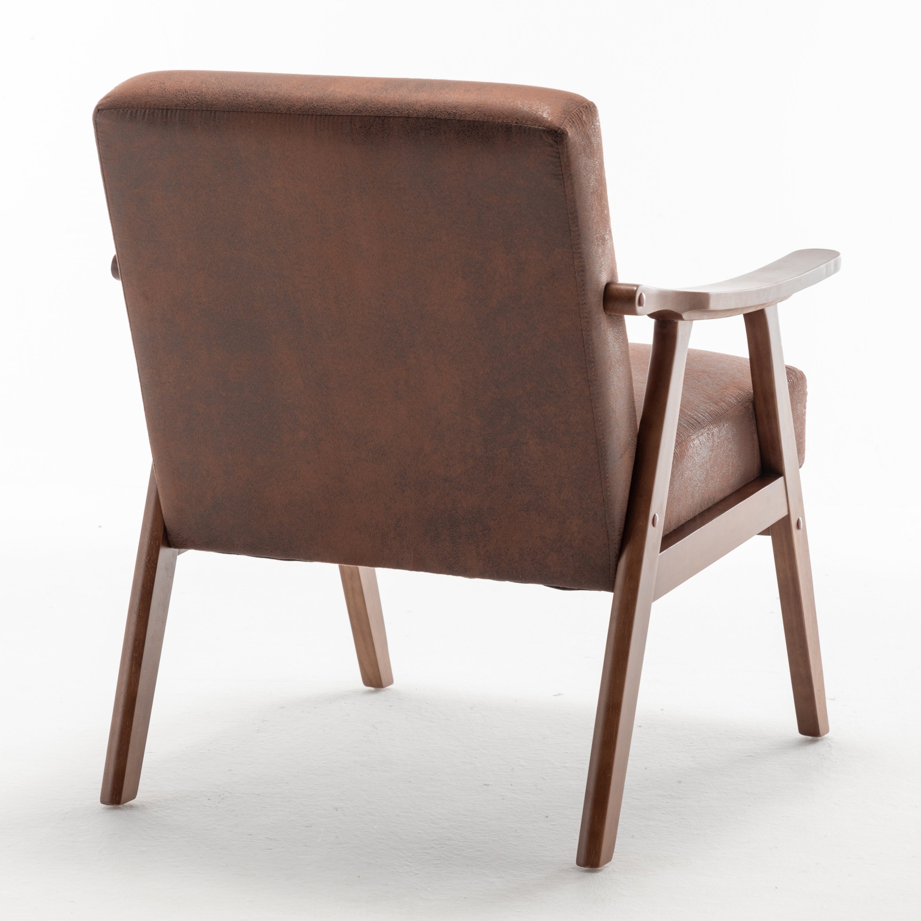 Wingback accent chair in bedroom