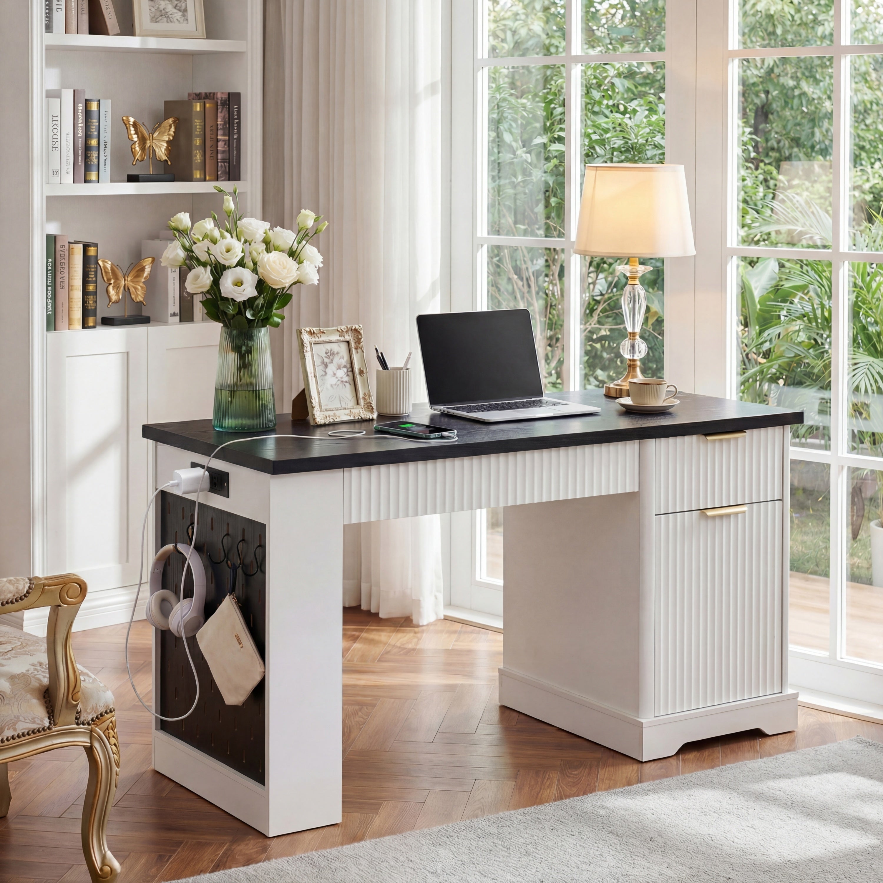 Modern white office desk with keyboard tray and drawer storage