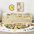 Natural pine twin floor bed with fence — front view
