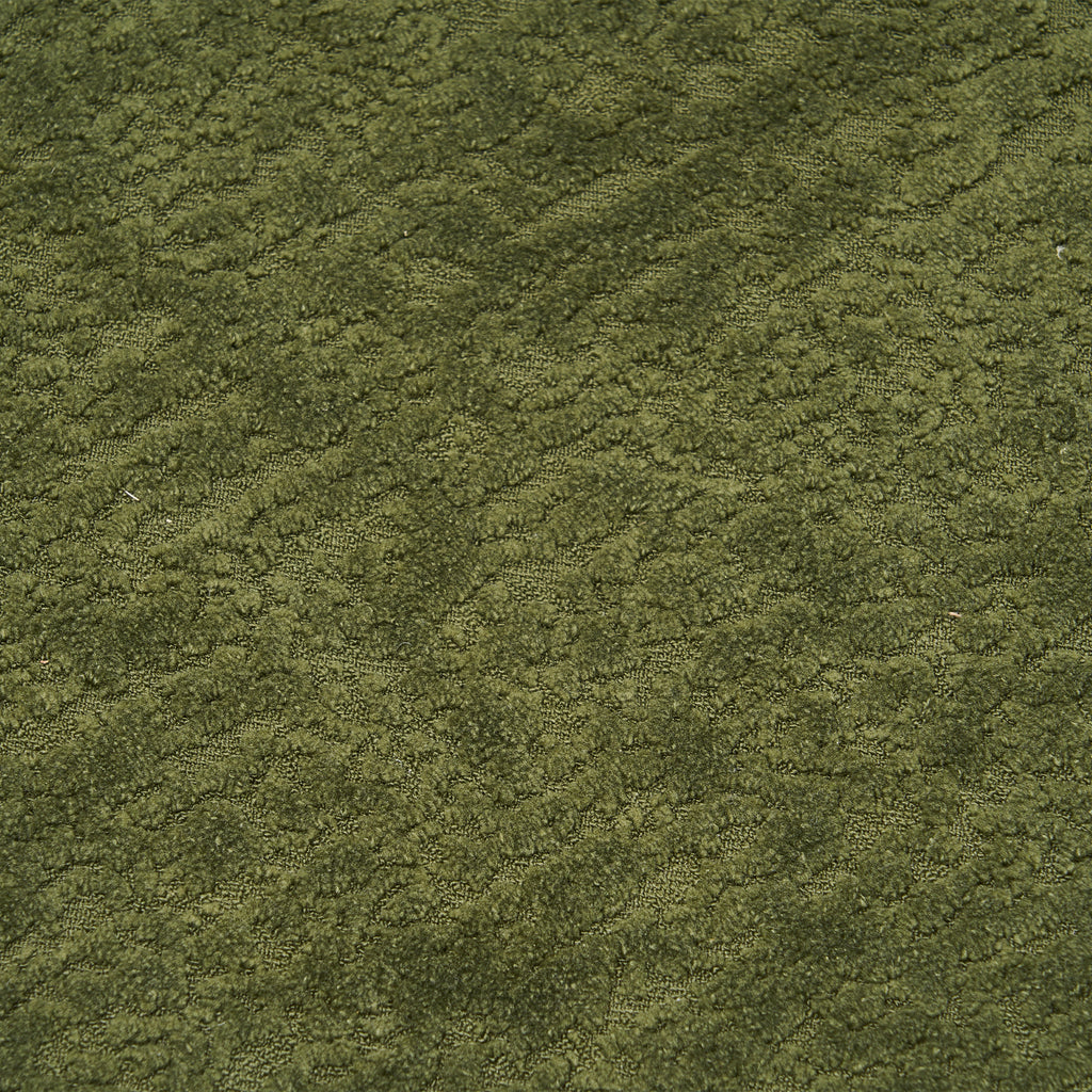 Chenille upholstery close-up — forest green
