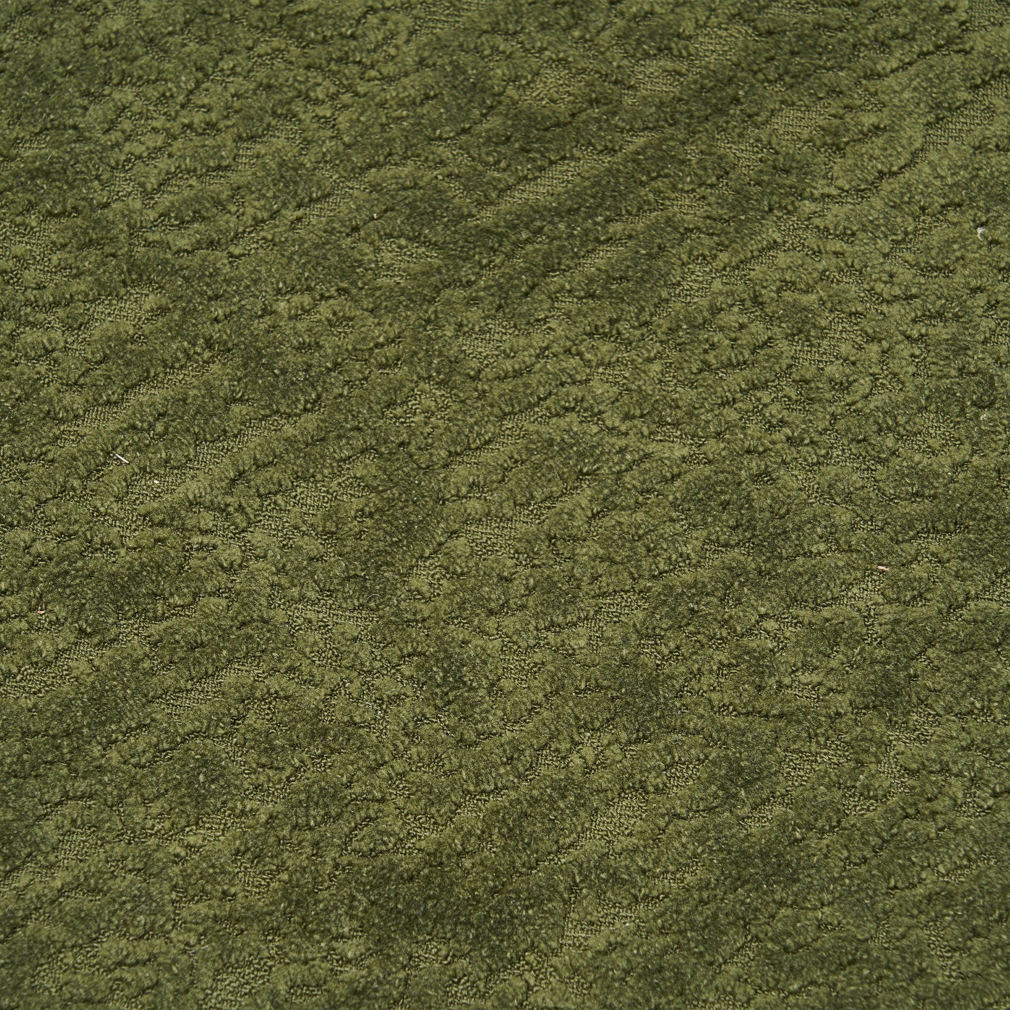 Chenille upholstery close-up — forest green