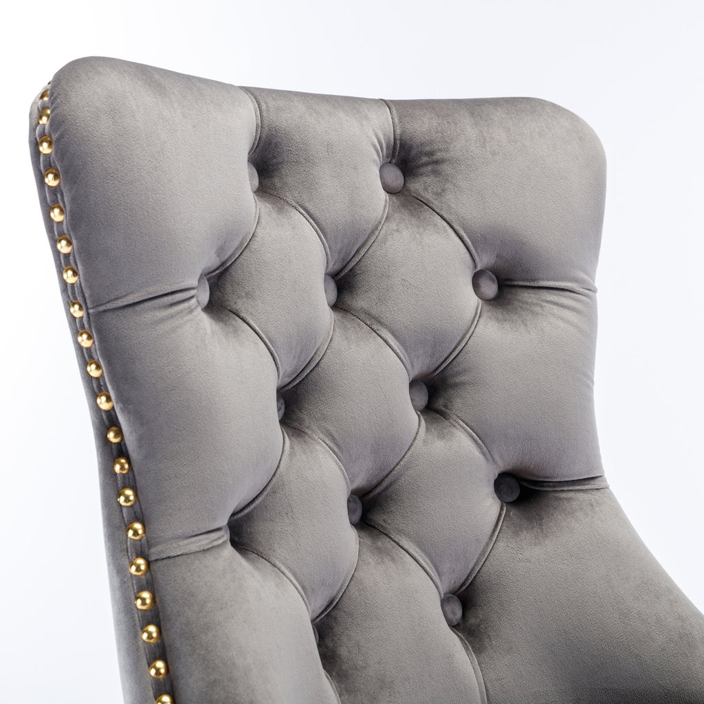 Gray velvet swivel office chair in home office setting
