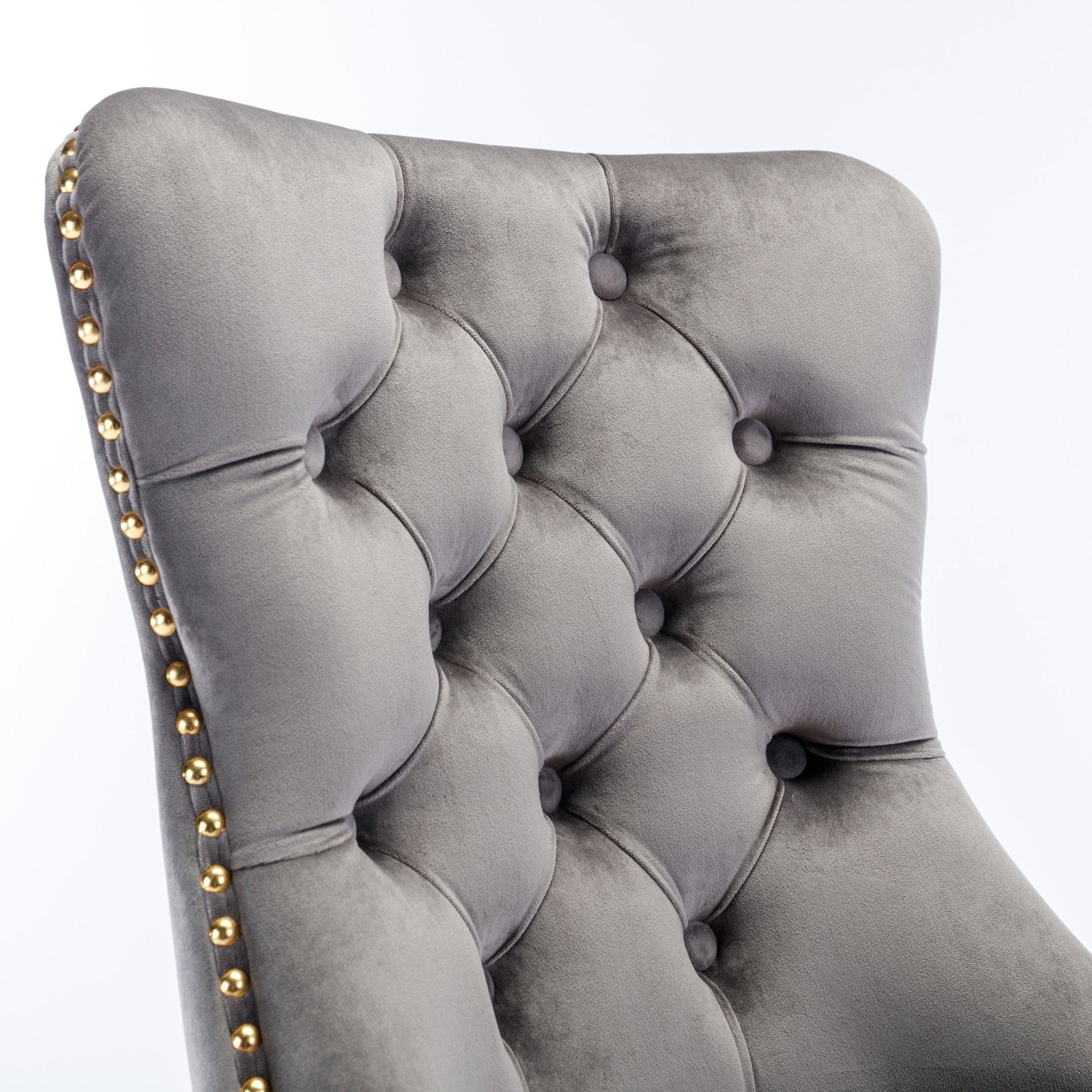 Gray velvet swivel office chair in home office setting