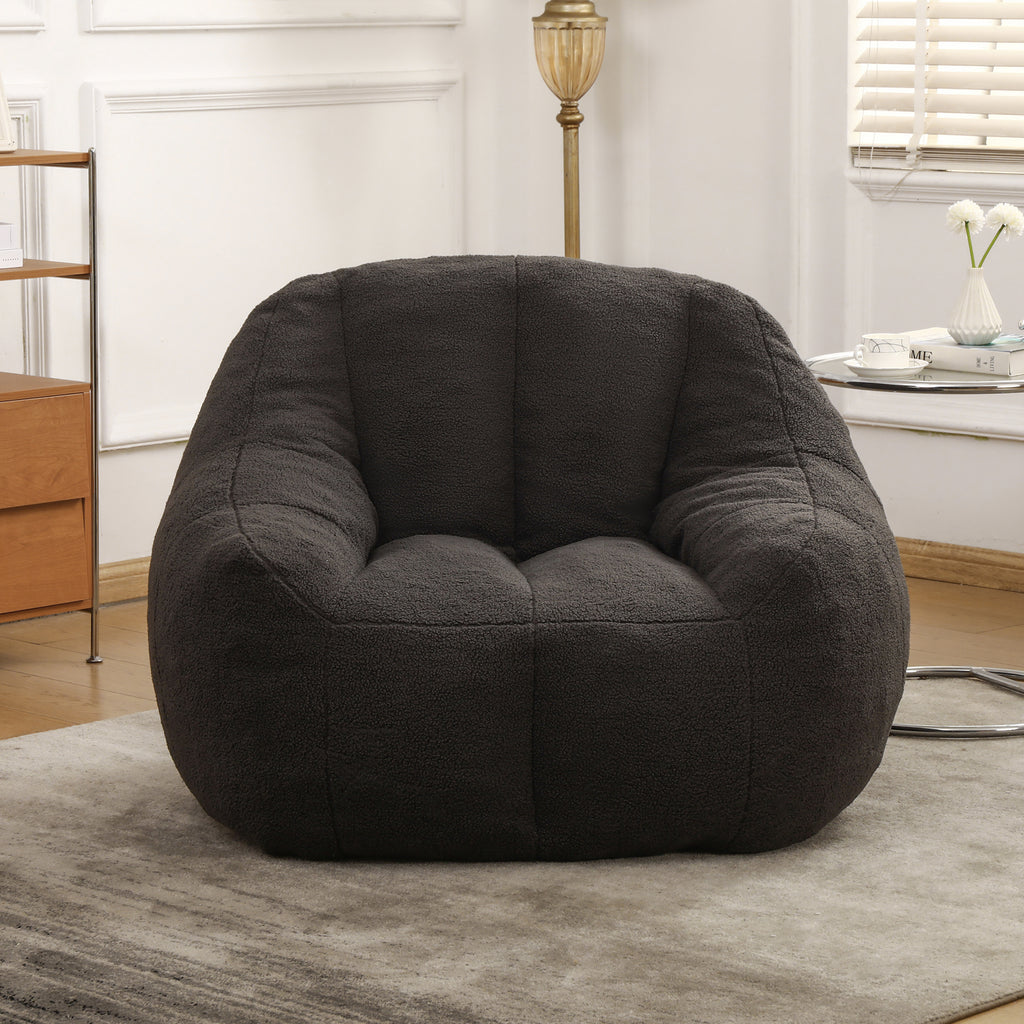 Dark gray teddy faux fur upholstery close-up