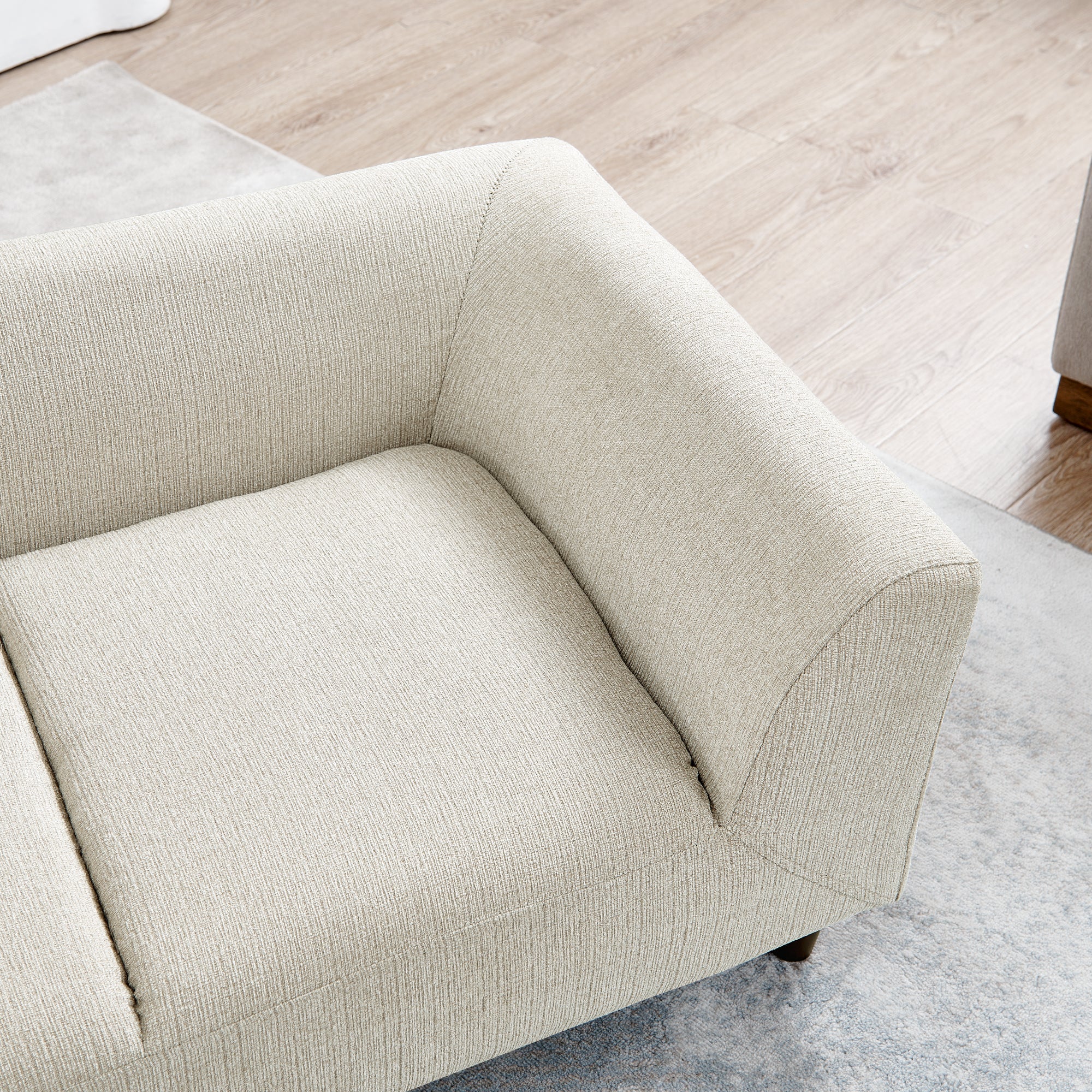 Small dog on beige pet sofa — lifestyle photo