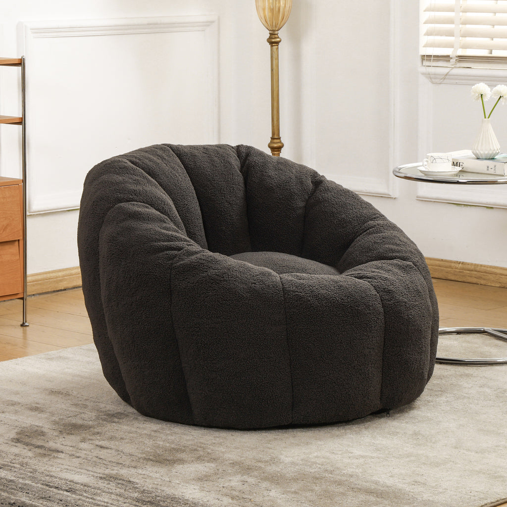 Dark gray teddy bean bag sofa chair with armrests — front view