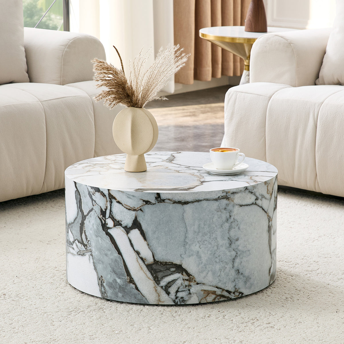 A simple white marble textured cylindrical coffee table, 23.6 inches in diameter x 11.8 inches in height, MDF material living room furniture. Suitable for industrial style or minimalist living rooms.