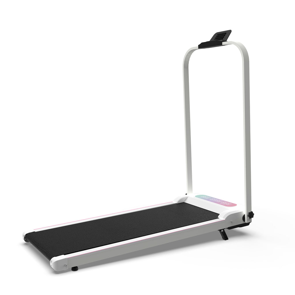 White home office treadmill beside desk workstation