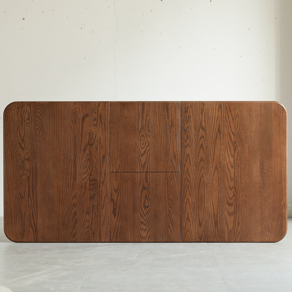 Solid oak dining table compact length stored against wall