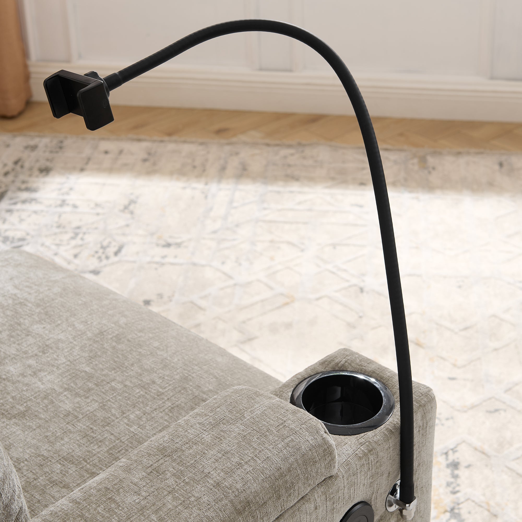 Wood frame and plastic leg detail under recliner