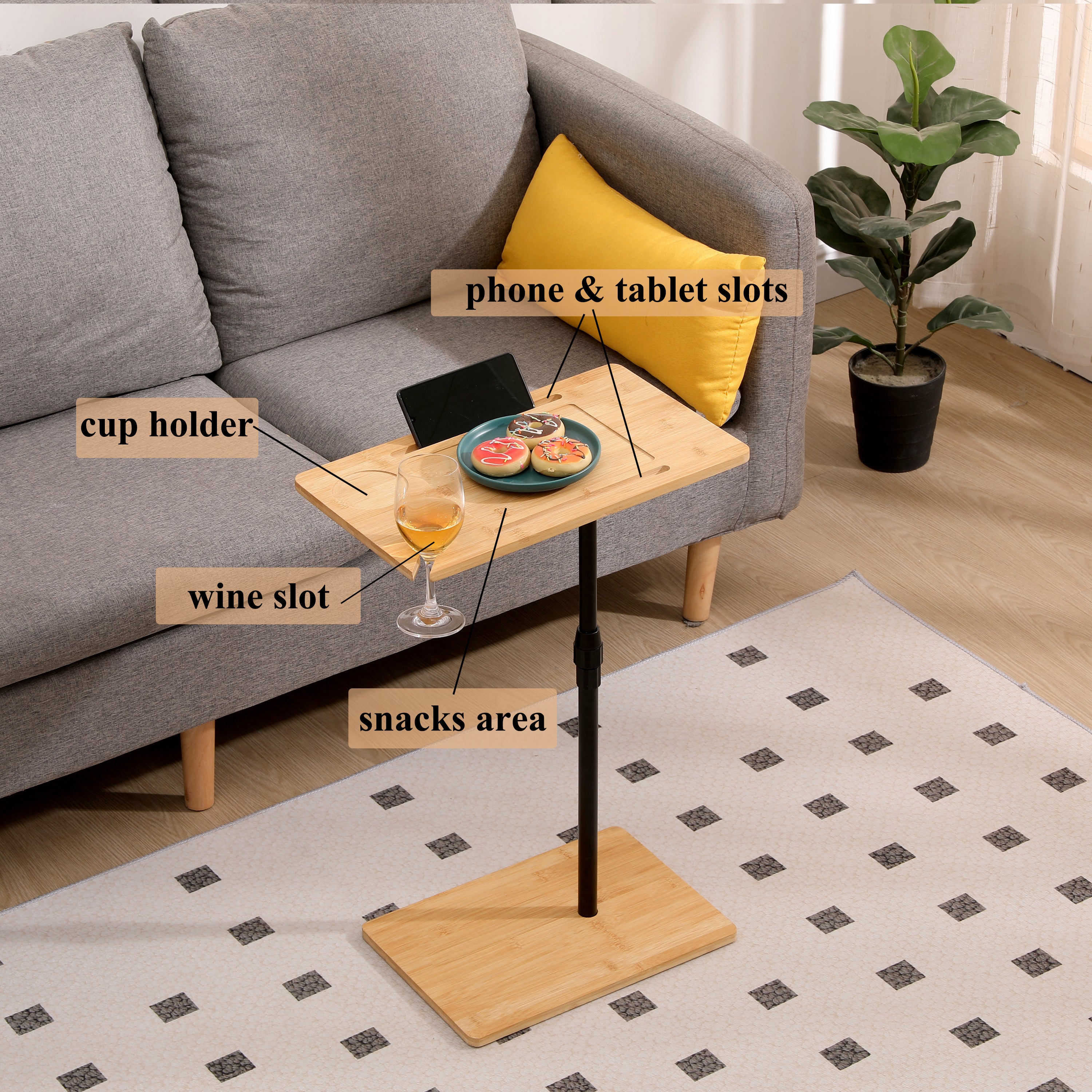 C-shaped couch tray table in living room beside sofa