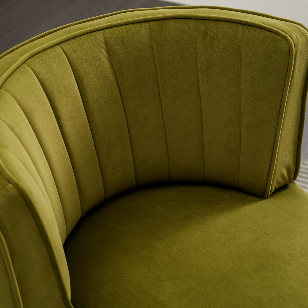 Olive velvet chair in living room setting