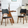 2 walnut colored solid wood dining chairs, with black PU soft packaging on the backrest and seat cushion, hollowed out design backrest, for home dining chairs.