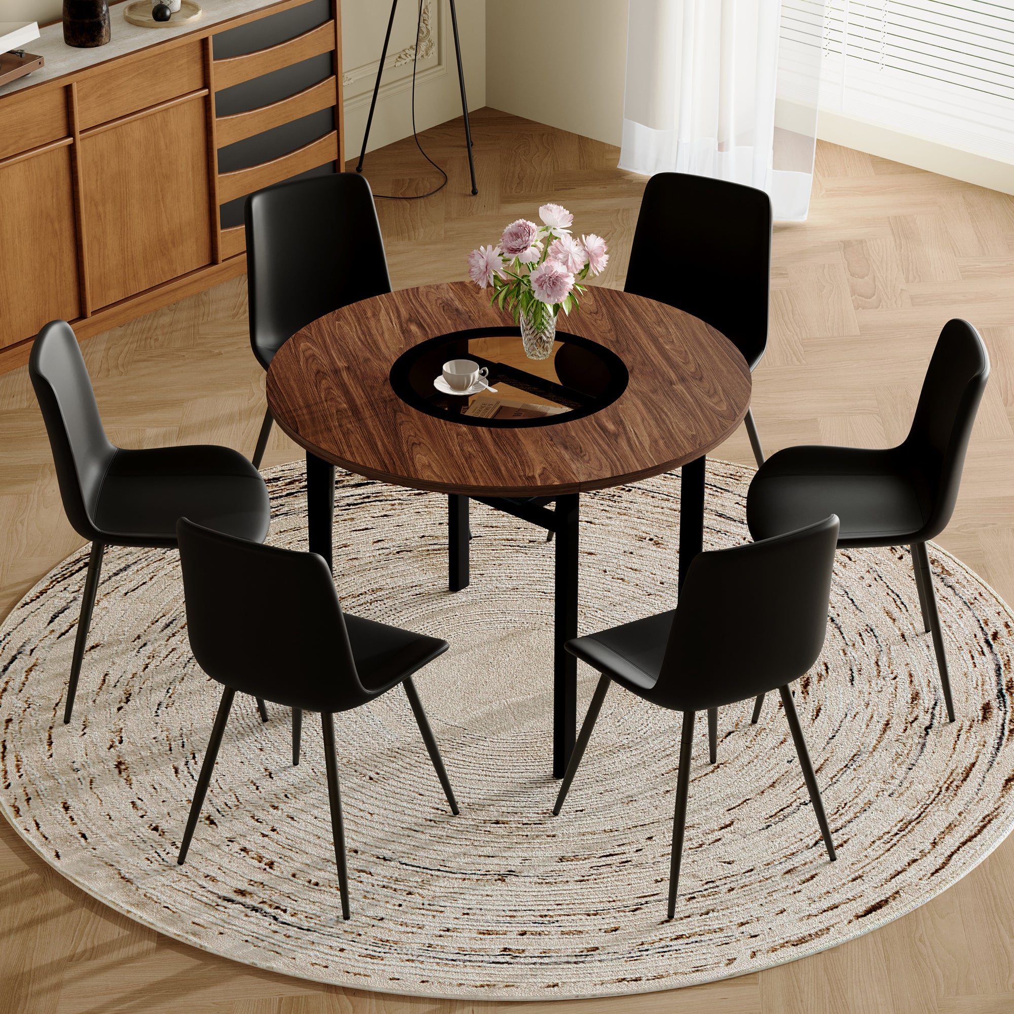 Table and chair set.42 inch modern minimalist brown wood grain round dining table set.Paired with 6 Black Artificial PU Chairs With Curved Widened Cushion Design. Suitable for dining rooms,office,etc.