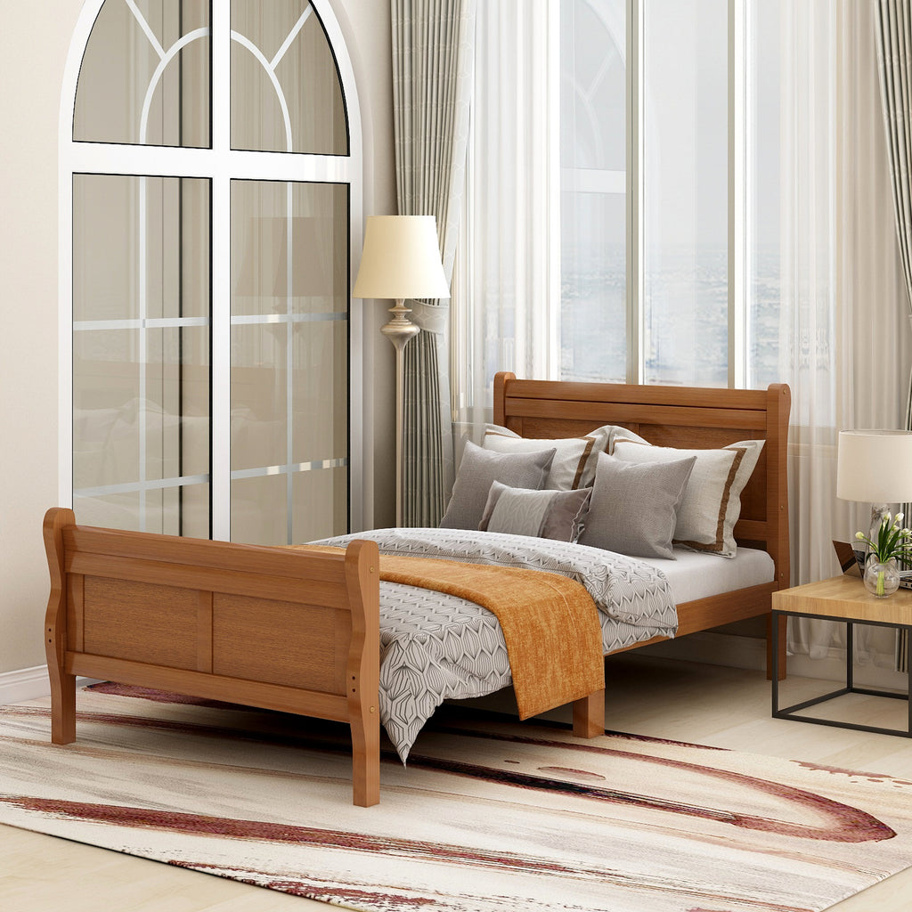 Twin sleigh platform bed in oak finish — angle view