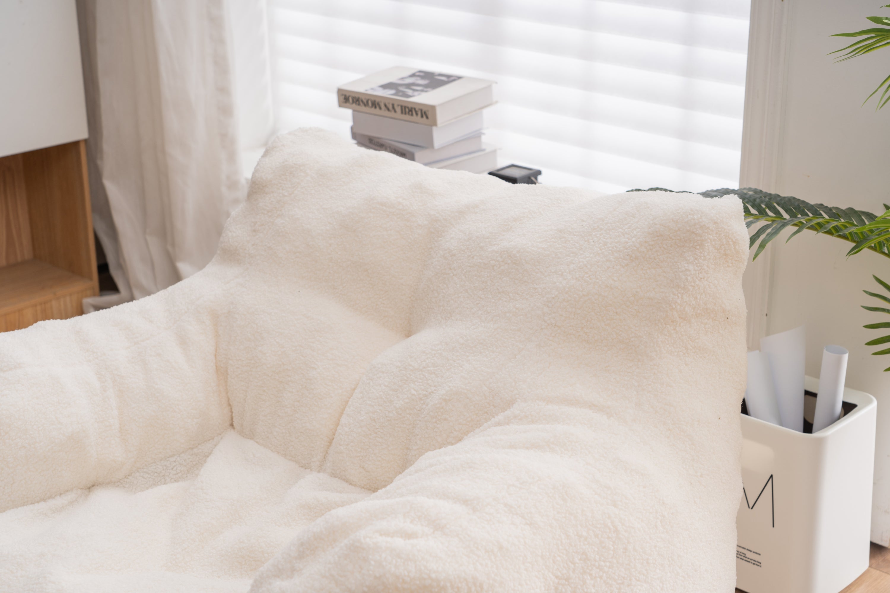 Ivory bean bag in dining room corner