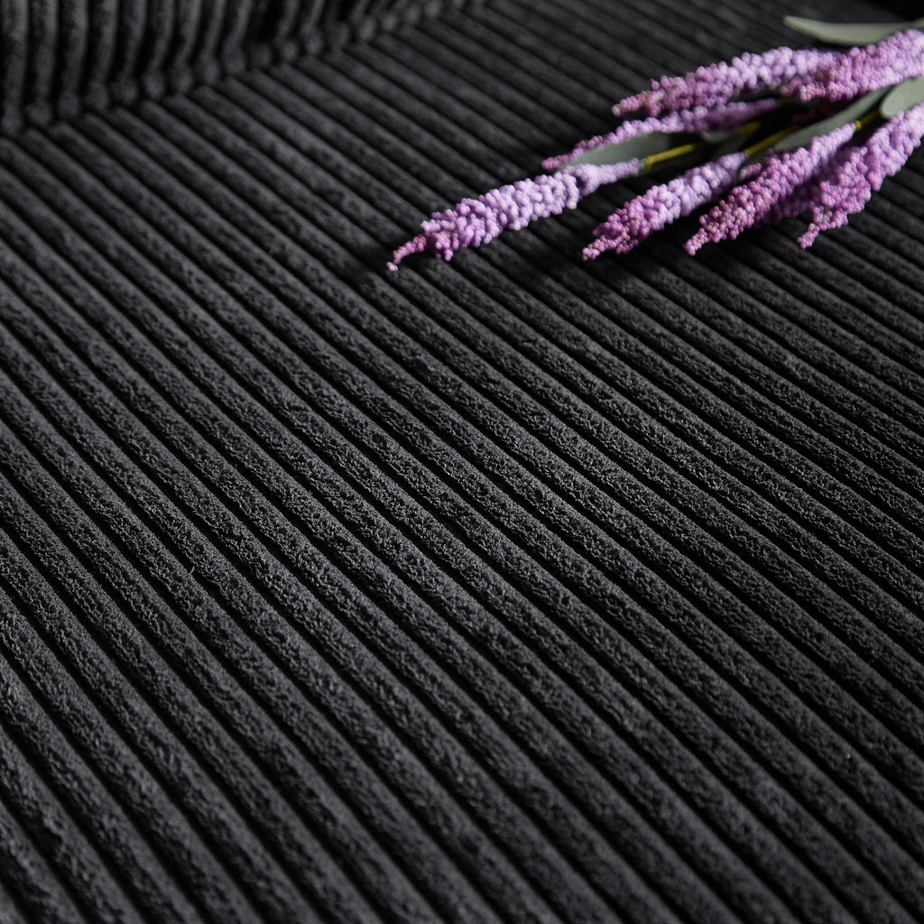 Black compressed corduroy couch block legs and center support