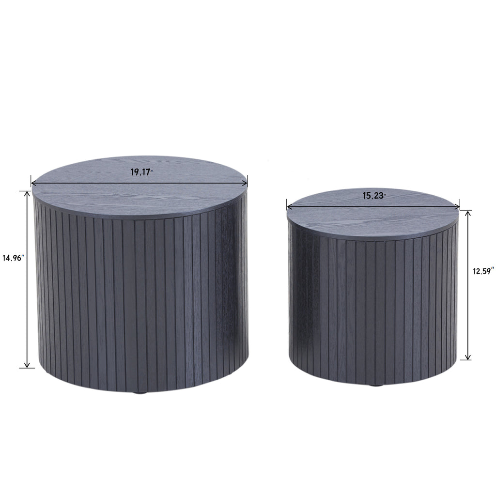 Black round coffee table large and small tables stacked