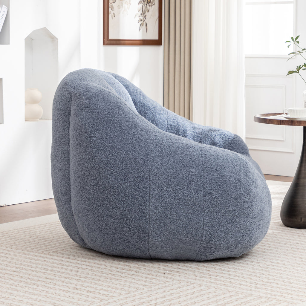Light blue bean bag chair with armrests side profile