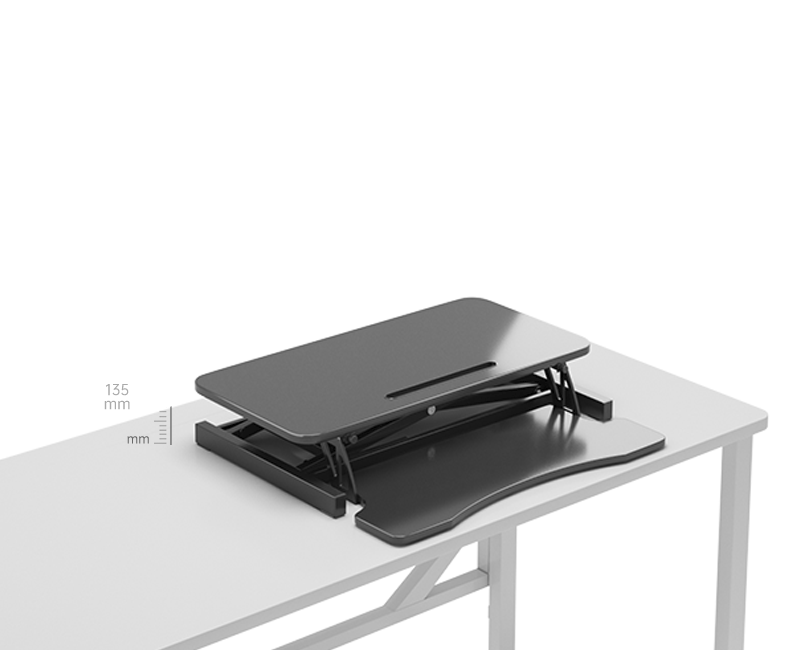 Black sit to stand desk riser with wide keyboard tray — animated demo