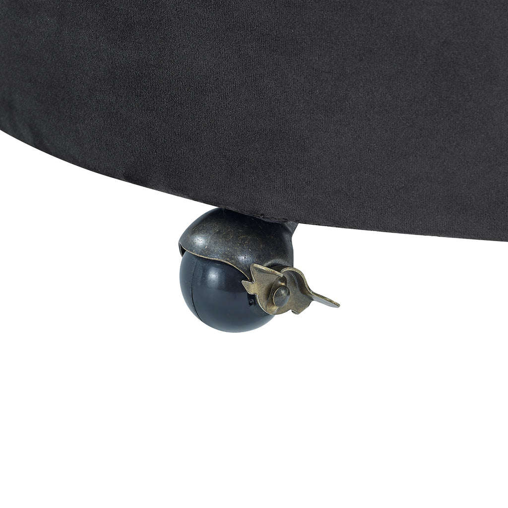 Black velvet swivel accent chair side profile with wheels
