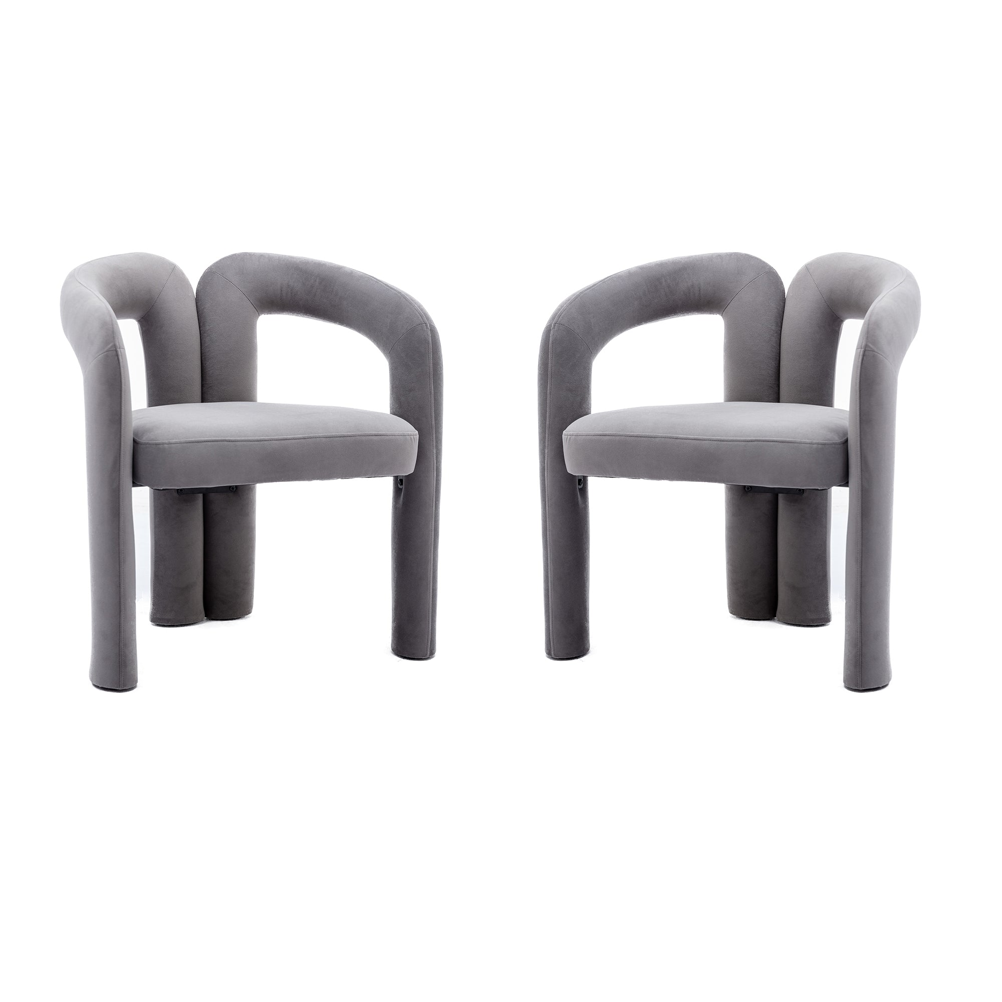 Gray velvet barrel dining chair with curved backrest — angle view