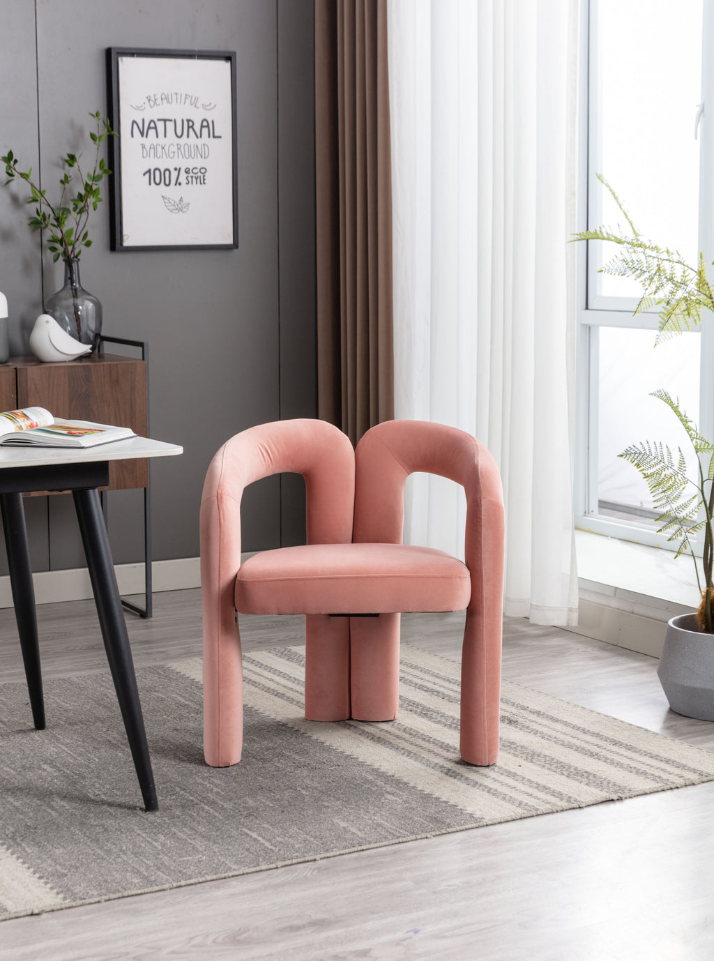 Pair of pink velvet chairs side by side