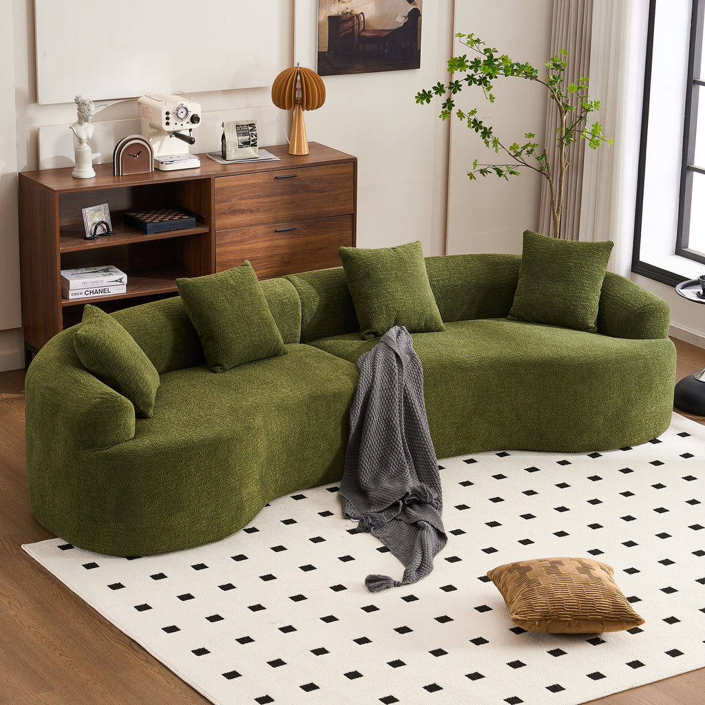 Green chenille sectional in living room setting