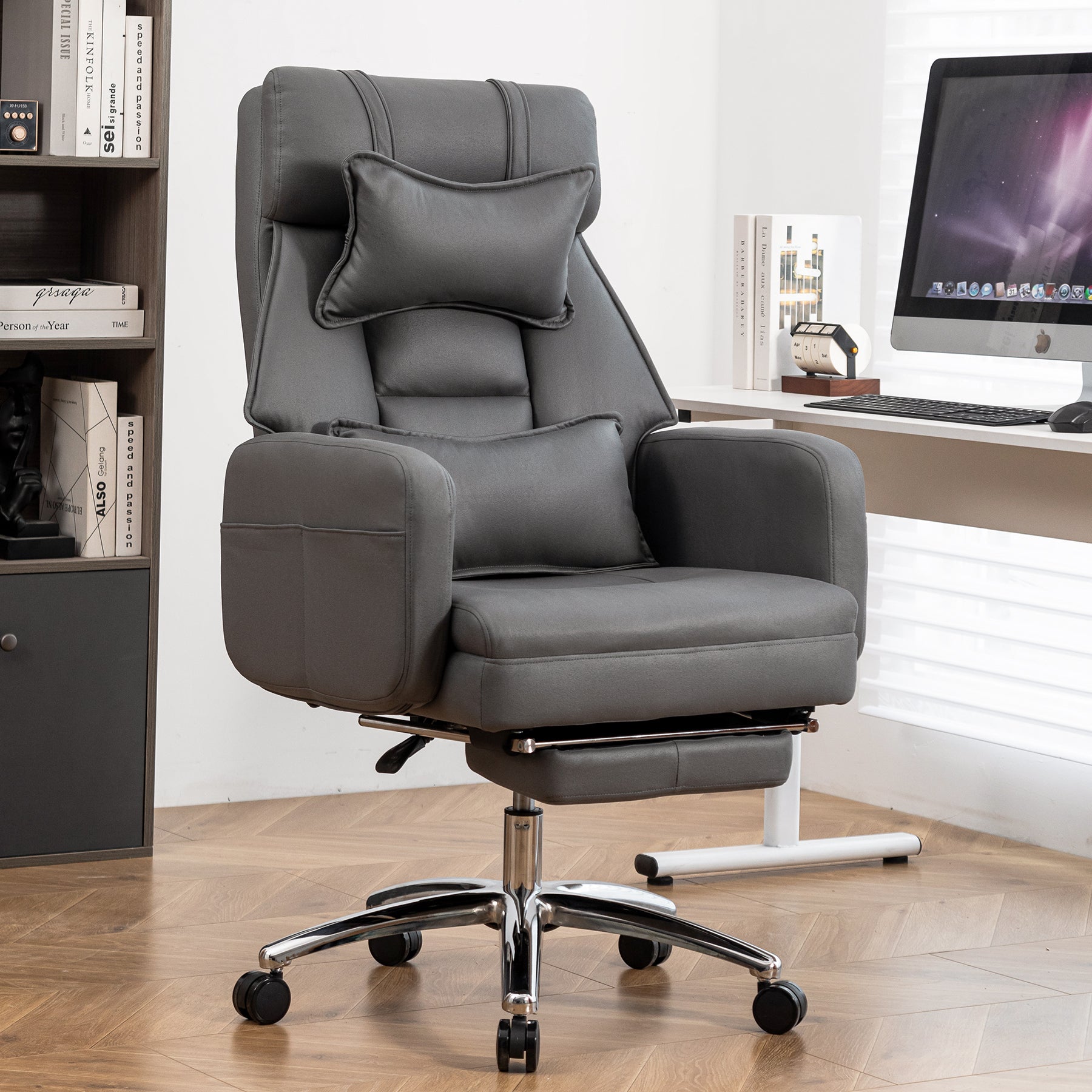 Dark grey swivel ergonomic office chair — front view