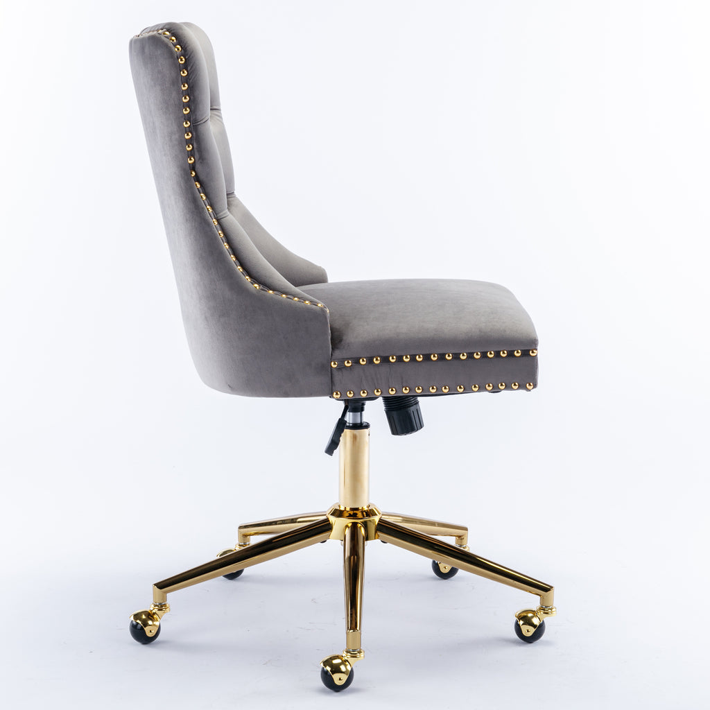 Gray velvet office chair side profile with wheels