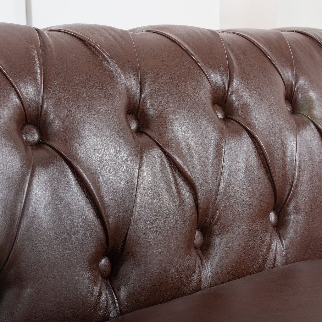 Deep tufted backrest and frame construction