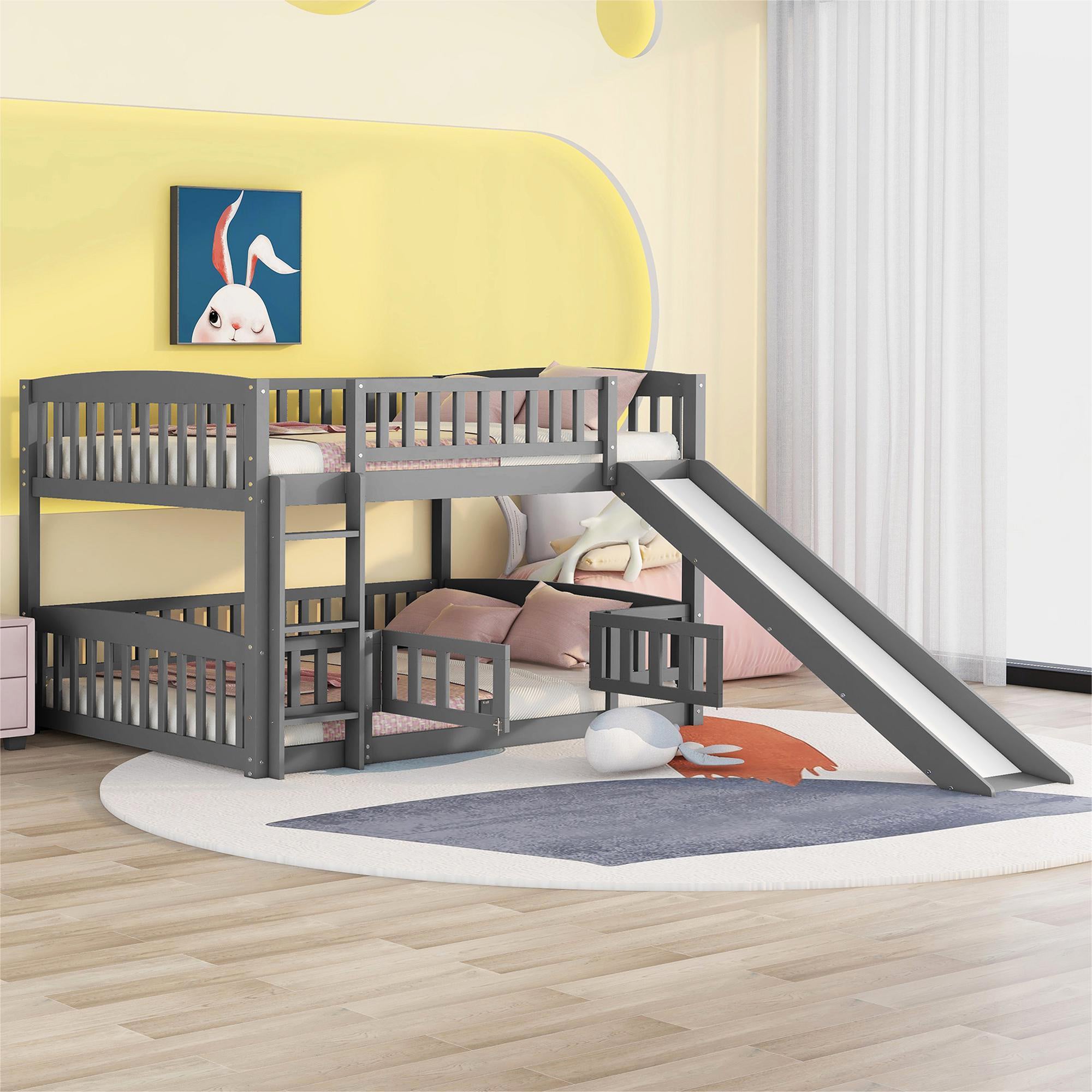 Gray full over full bunk bed with slide and fence — front view