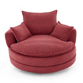 Red corduroy swivel barrel chair — front view