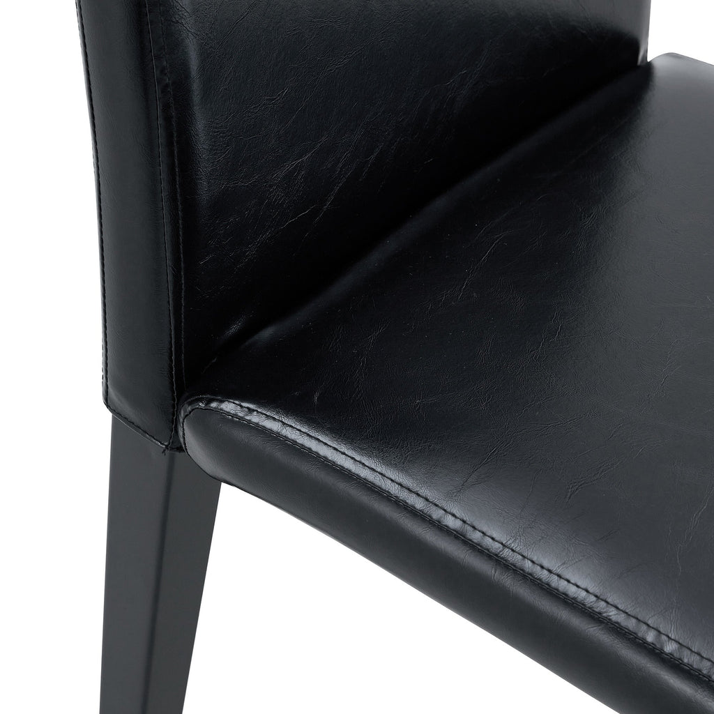 Table and chair set. 71 * 35.4 inch Wood grain MDF splicing desktop with X-shaped metal frame dining table.Includes 8 white PU dining chairs With Black Metal Legs.Making it an ideal choice for home.