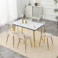 Table and chair set.White imitation marble texture glass top + lower black MDF board,golden metal tapered legs.Paired with 6 Transparent Plastic Chairs with Golden Metal Legs.