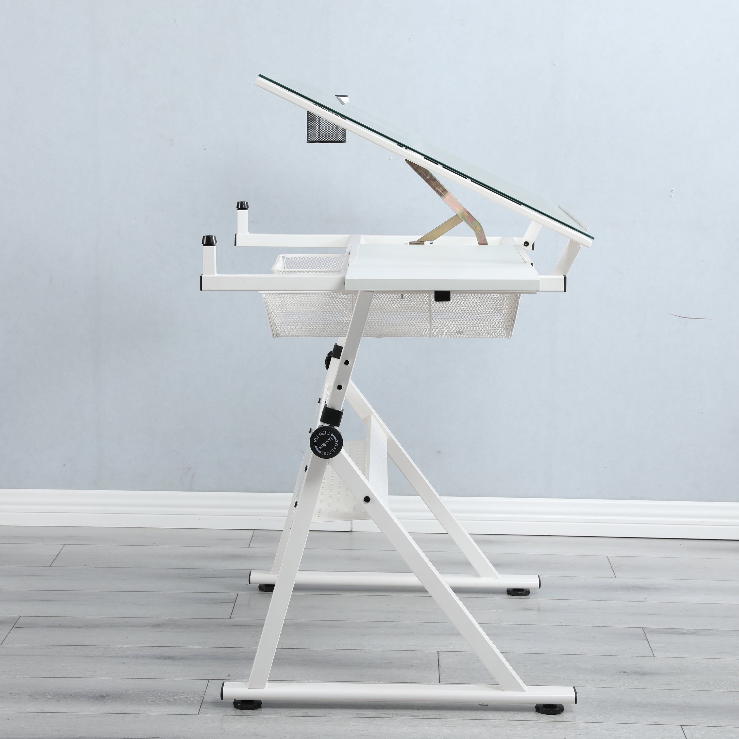 White drafting desk in home studio or art room setting