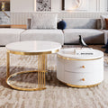 White round nesting coffee table set of two with gold legs — front view