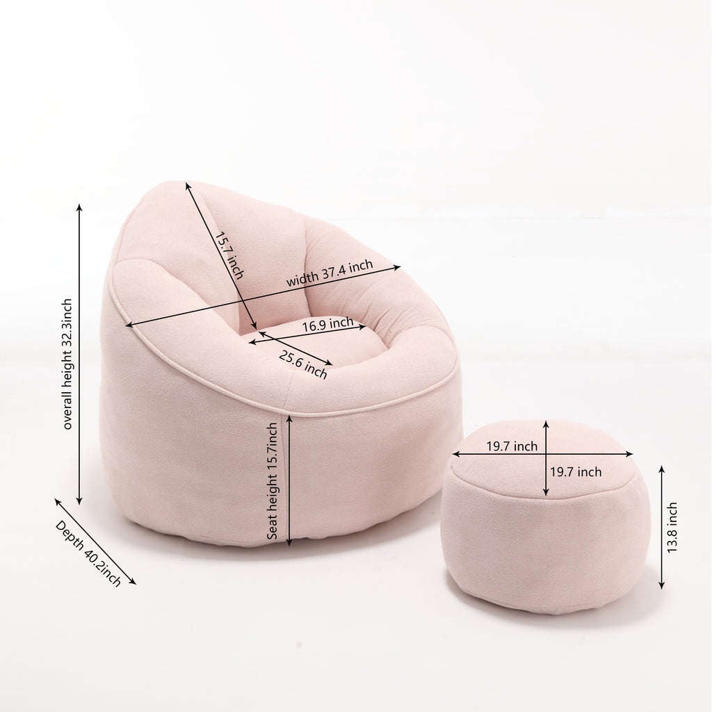 Pink microfiber bean bag chair in living room setting
