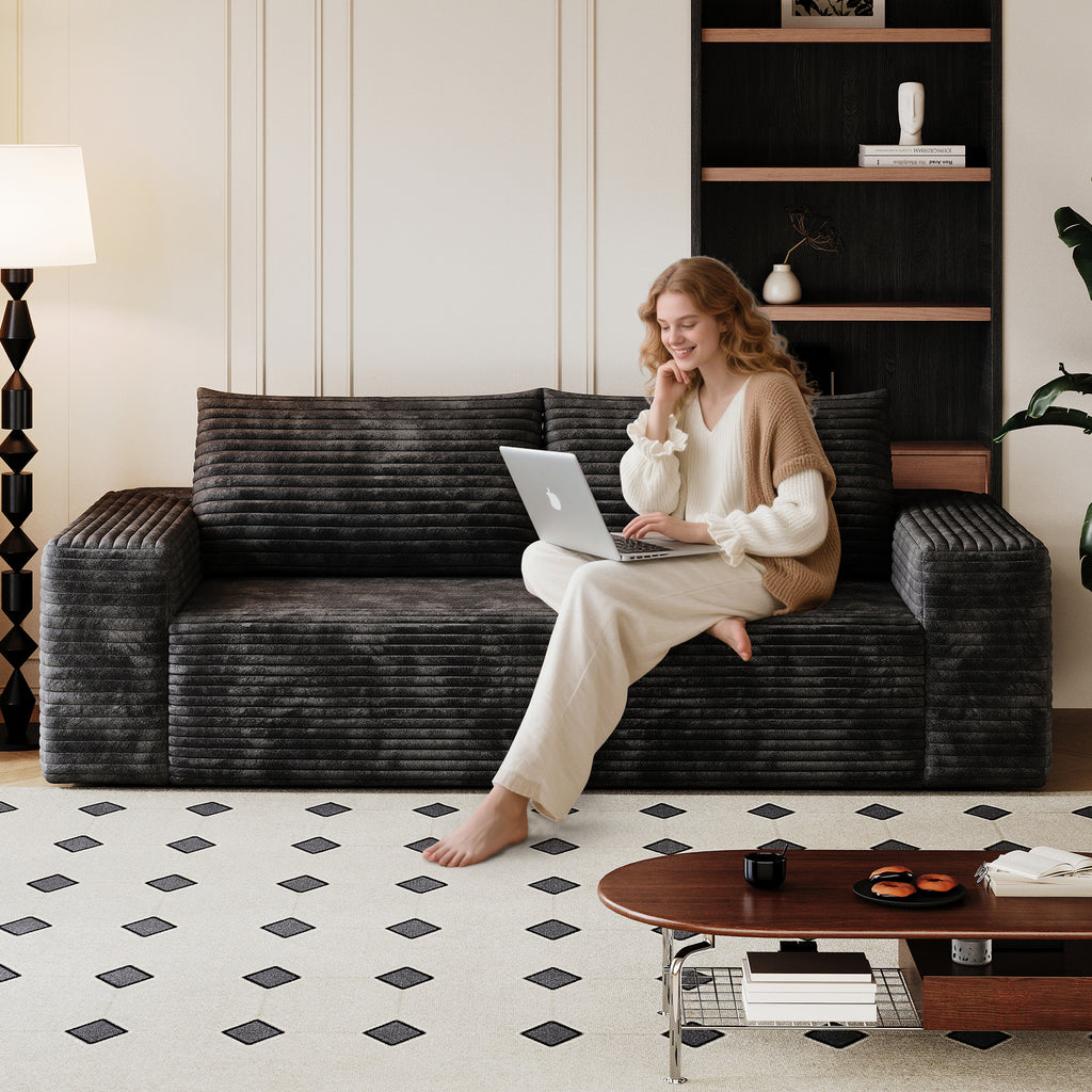 71-inch black corduroy loveseat — angle view