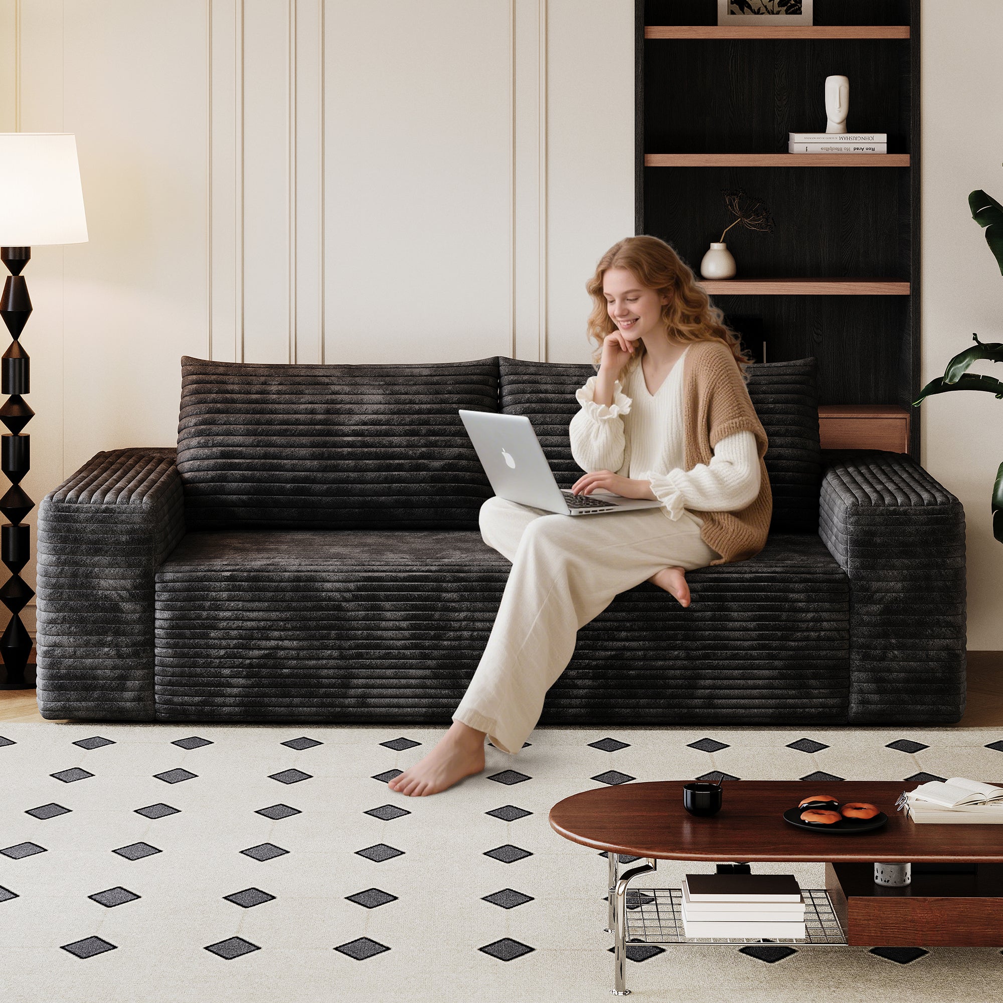 71-inch black corduroy loveseat — angle view