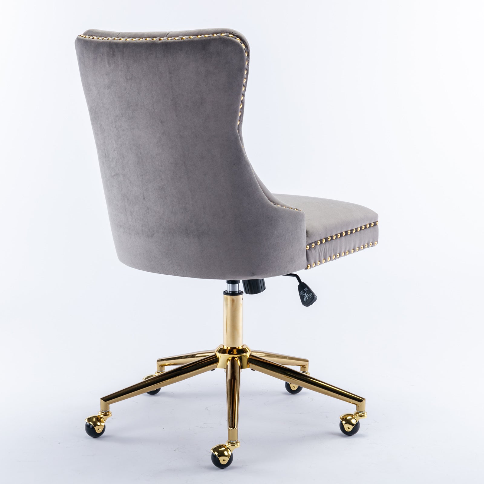 Gold metal base detail on gray desk chair