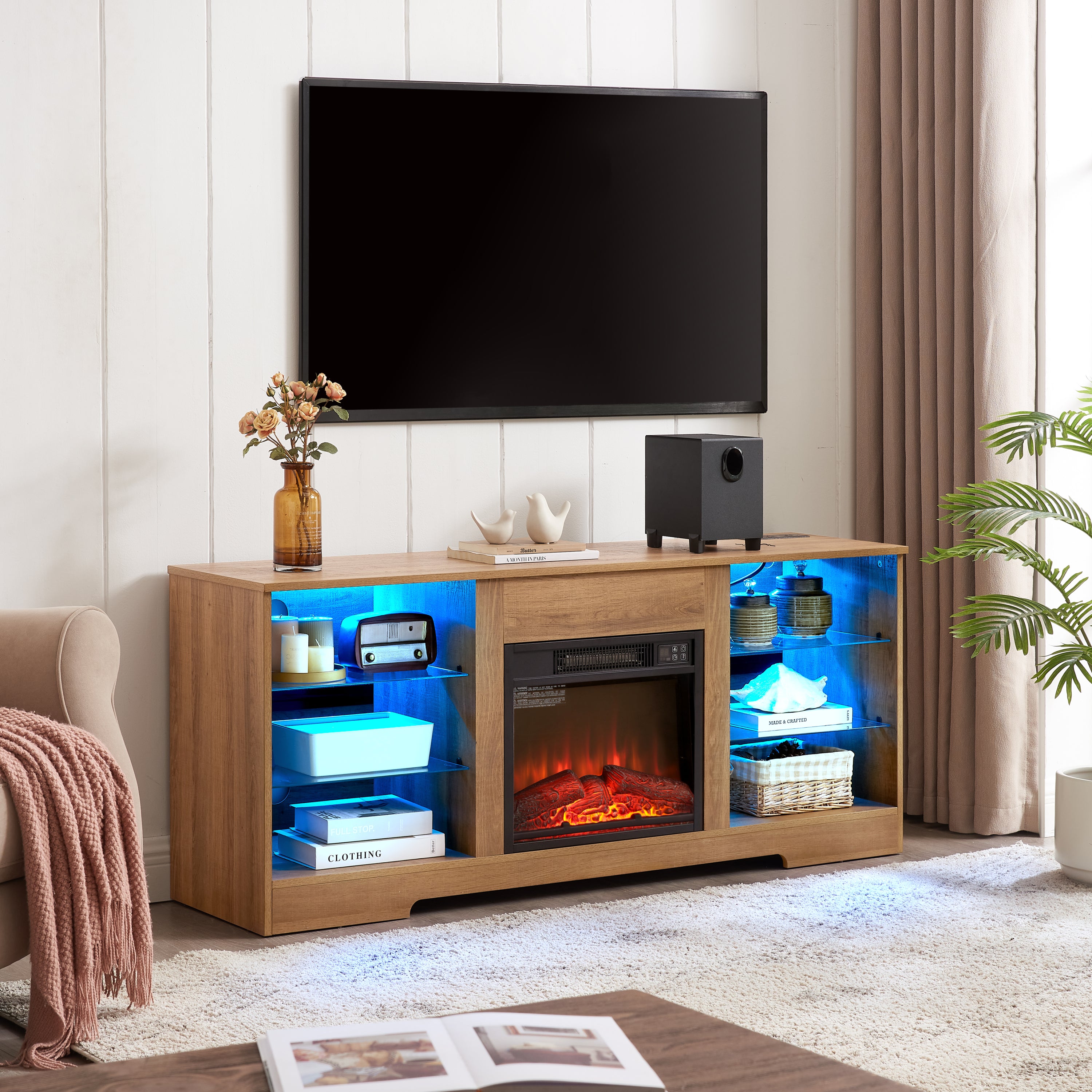 Oak entertainment center with LED fireplace flame effect
