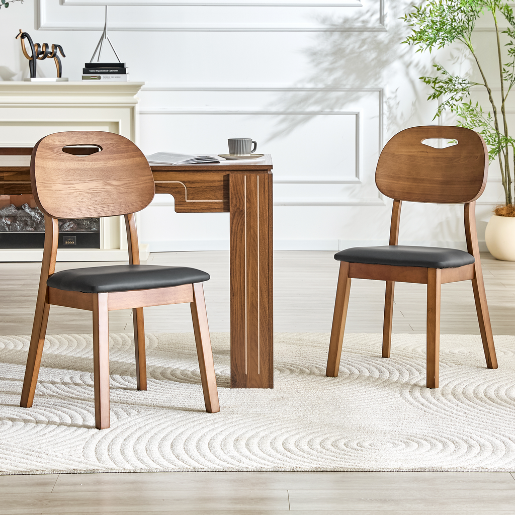 2 walnut colored solid wood dining chairs, black PU soft seat cushions, hollowed out backrests, and home dining chairs.