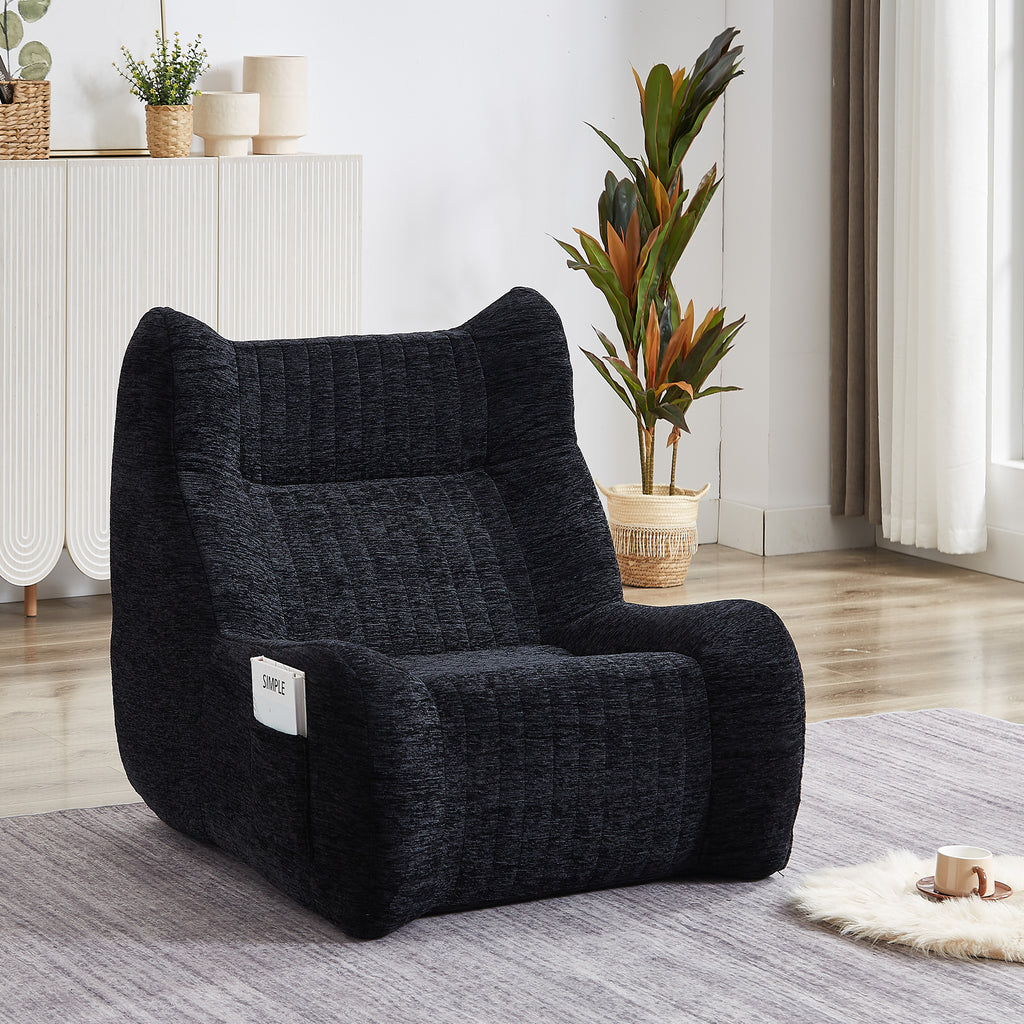 Oversized black floor sofa bean bag in living room setting