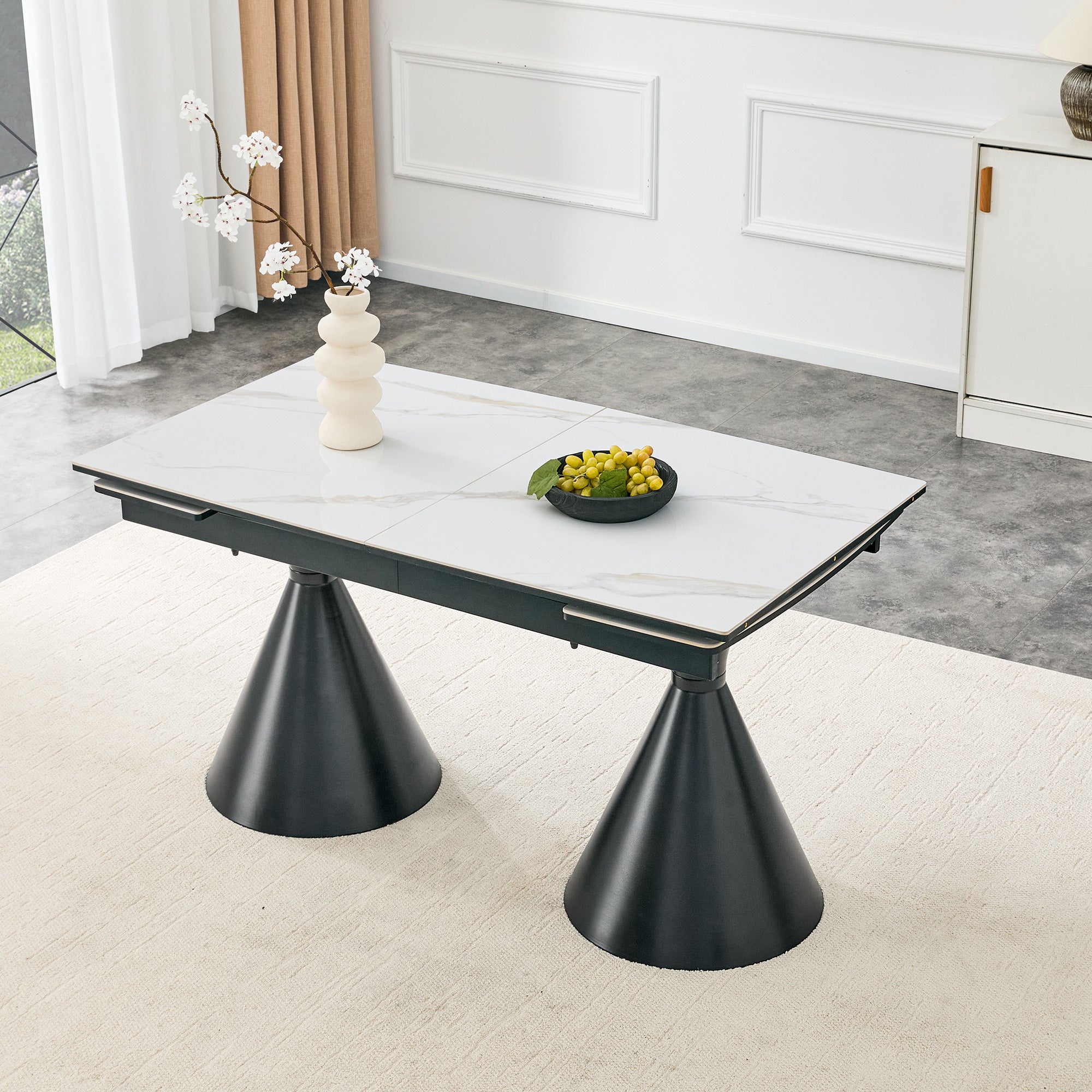 Extendable Stone-Top Dining Table: White marble-patterned tabletop with black tapered metal legs. A modern, luxury-inspired rectangular dining table for home use, suitable for 4–8 people.
