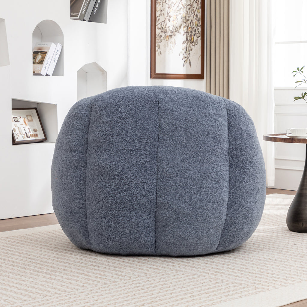Light blue bean bag chair in dorm or bedroom setting