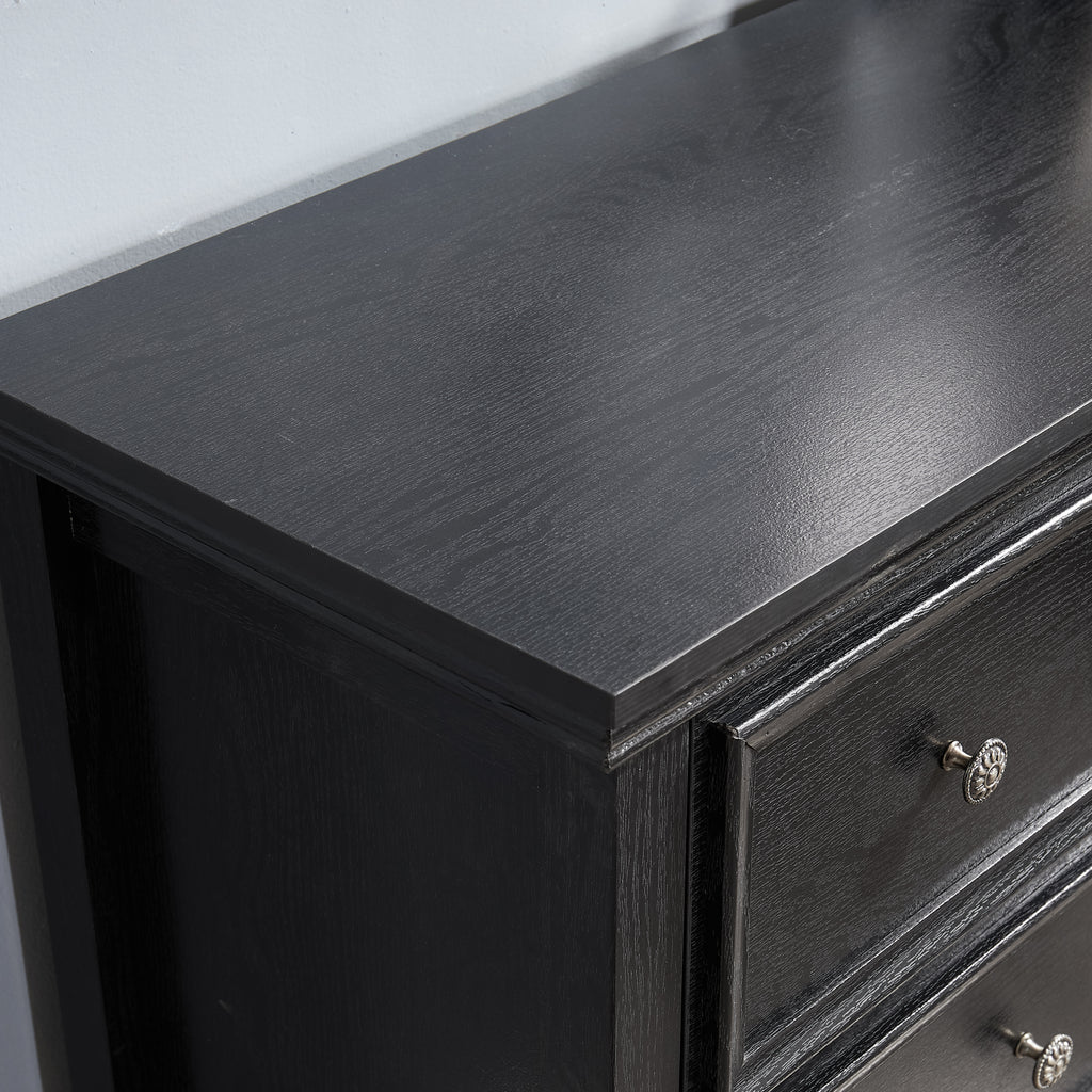 Black bedroom dresser drawer open interior view
